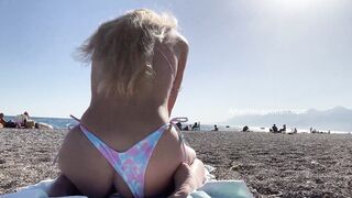 Hot blonde bares her perfect titties and elastic butt on a outdoors beach.