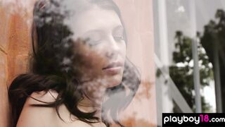 Sassy brunette beauty flashes her boobs
