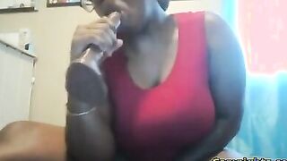 Hot Ebony playing with a dildo for you