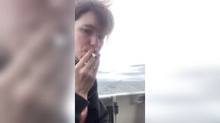 sexy beauty Smoking And Flashing on a boat