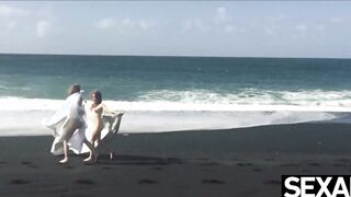 View these 2 goddess redheads have wild lesbo sex on the beach