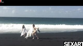 Watch these two goddess redheads have wild lesbo sex on the beach