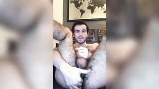Fingering his hairy ass hole