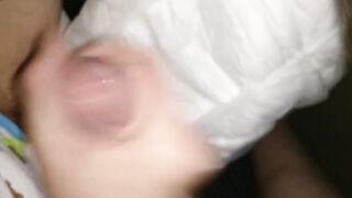 Twink cumming his wet diaper