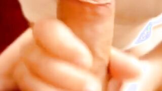 Blowing and stroking my friend and he cums in my mouth