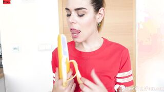 Adorable women eats a banana and fingering herself
