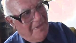 Slut demonstrates dildo to old man