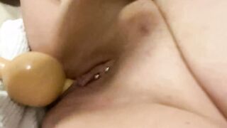 Kinky whore stuffing her cunt