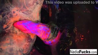African-light babes Nadia White and Ophelia suck off a colorful penis