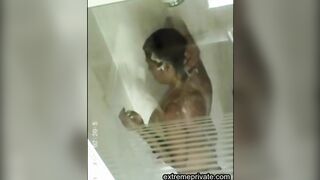 Stepmom soaps her big tits in the shower