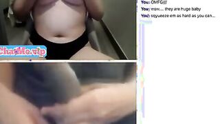 Playing with her huge natural tits