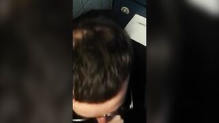 Hot bearded guy sucking guy in public restroom