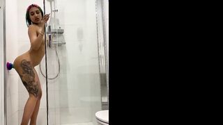 Inked barely legal gril fucking her sex sex toy into the shower