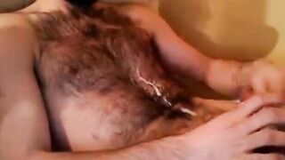 Hairy chest covered in cum