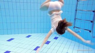 Big titted dark hair Hottie Zuzanna swimming inside the pool