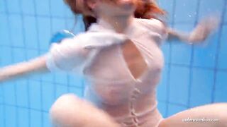 Big titted dark hair Hottie Zuzanna swimming inside the pool