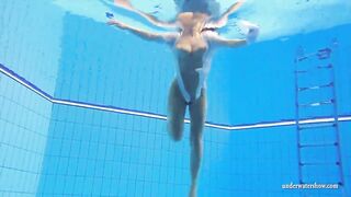 Big titted dark hair Hottie Zuzanna swimming inside the pool