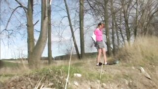 Electra Angels peeing outdoors by the river