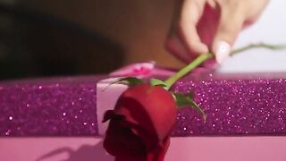 Sensual Latina sexy Veronica Rodriguez returns home from work to find a trail of rose petals leading to a gift