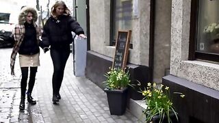 Elza A and her gf Lesya walk the streets hand in hand as they enjoy some sightseeing. They stop in