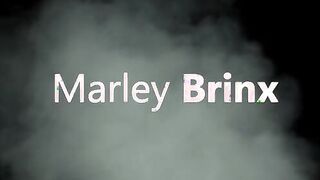 Marley Brinx is ready to make a naughty clip as she struts her stuff into the dark. Her medium titties