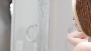 Winter Jade is ready for the shower as she stares at herself into the WC mirror. She drops the towel