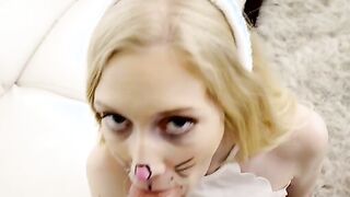 Perky little spinner Emma Stone is in the Easter spirit as she wanders her house dressed as the Easter bunny.