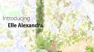 On a warm summer afternoon good red haired Elle Alexandra dig the sunshine. She removes her