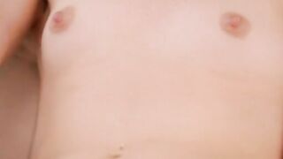 On a warm summer afternoon good red haired Elle Alexandra dig the sunshine. She removes her