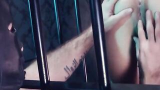 Caged whore fucking two long dicks hard