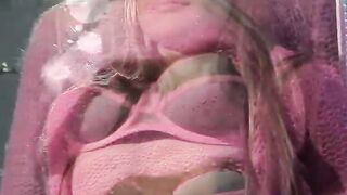 Hottie women watches herself in the mirror while she masturbates