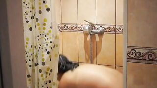 my moms chubby body foaming in the shower