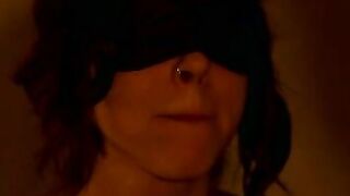 The clip is set for seduction. Luna Ruiz lets Lobo blindfold her and then sits patiently in her bra and