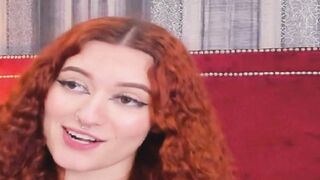 Curly Redhead Shaking While Rubbing Her Pussy