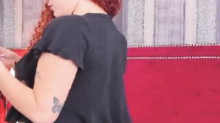 Curly Redhead Shaking While Rubbing Her Pussy