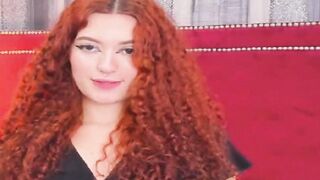 Curly Redhead Shaking While Rubbing Her Pussy