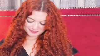 Curly Redhead Shaking While Rubbing Her Pussy