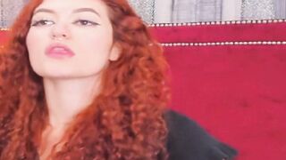 Curly Redhead Shaking While Rubbing Her Pussy