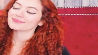 Curly Redhead Shaking While Rubbing Her Pussy