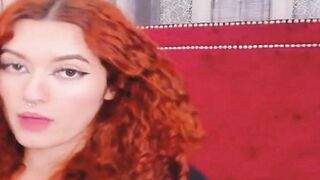 Curly Redhead Shaking While Rubbing Her Pussy