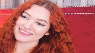 Curly Redhead Shaking While Rubbing Her Pussy