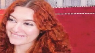 Curly Redhead Shaking While Rubbing Her Pussy