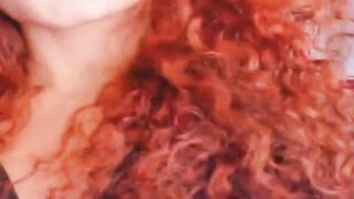 Curly Redhead Shaking While Rubbing Her Pussy