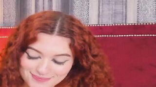 Curly Redhead Shaking While Rubbing Her Pussy