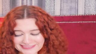 Curly Redhead Shaking While Rubbing Her Pussy