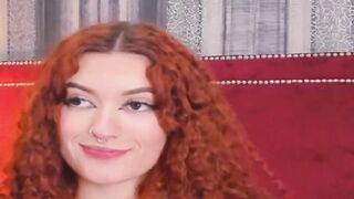 Curly Redhead Shaking While Rubbing Her Pussy
