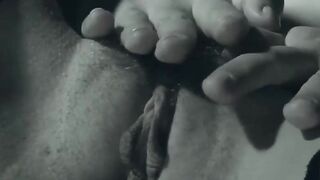 A finger in her tight butt while she rubs her bushy pussy