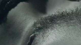 A finger in her tight butt while she rubs her bushy pussy