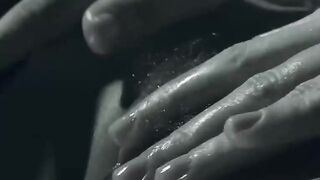 A finger in her tight butt while she rubs her bushy pussy