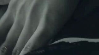 A finger in her tight butt while she rubs her bushy pussy
